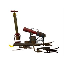 Blue and red painted gas powered bird / pest scarer, bearing label 'Exid bird & pest scarer, imported by C.R.E.A.C.O Hadleigh, Essex', , copper and brass Cymag gas hand pump, three eel spears and a set of badger tongs. Auctioneer's Note: These traps are sold as artefacts for ornamental purposes only as the use of some of them is illegal.