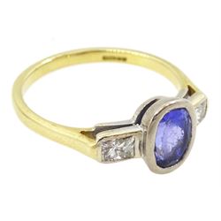 18ct gold three stone oval cut tanzanite and radiant cut diamond ring, hallmarked, tanzanite approx 1.10 carat, total diamond weight approx 0.40 carat