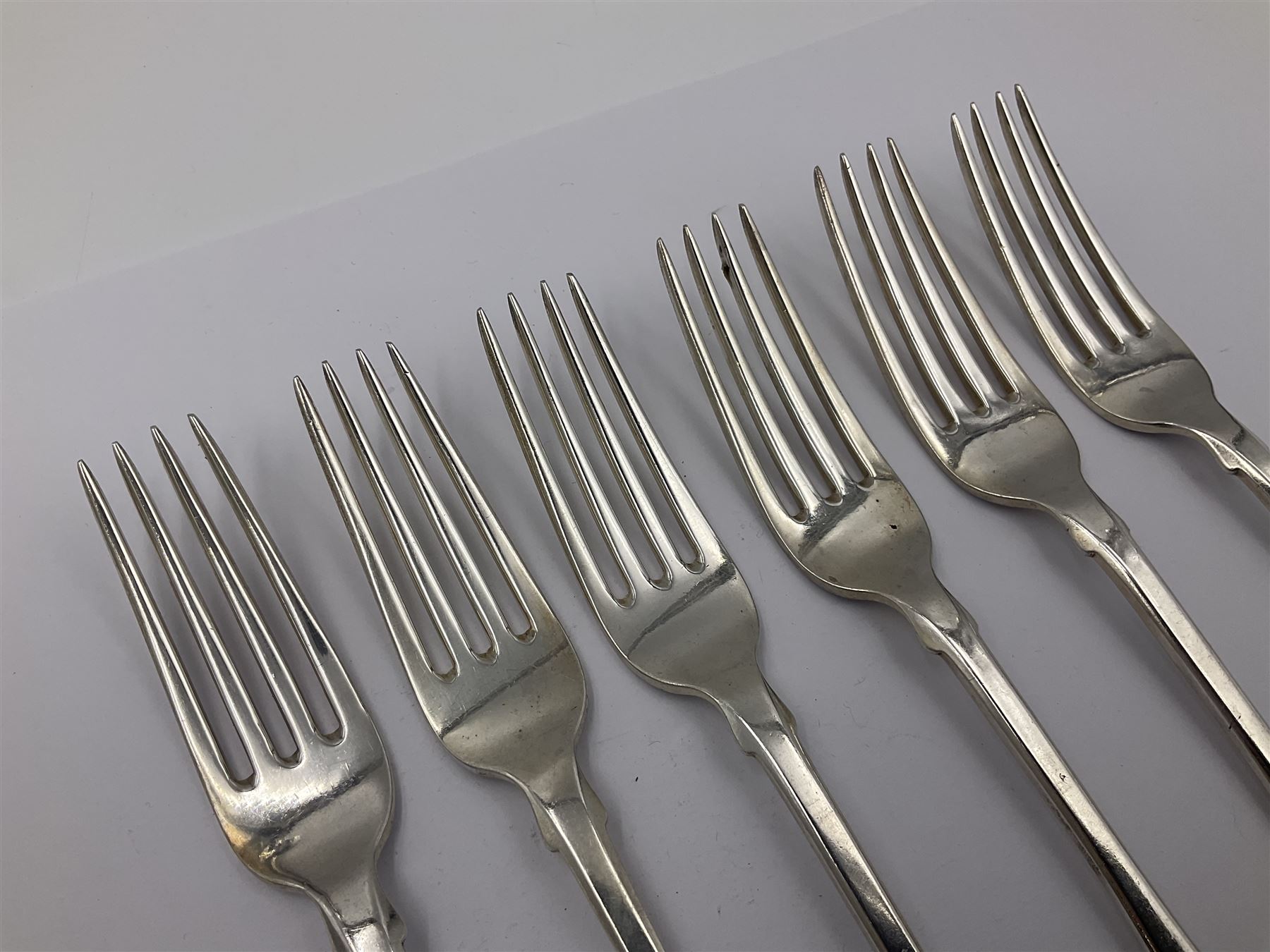 George IV Scottish silver Kings pattern cutlery for six place settings, to include table spoons, table forks, dessert spoons and dessert forks, all engraved with shamrock crest to terminal, hallmarked Robert Gray & Son, Glasgow 1833