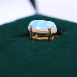 Pair of 9ct gold oval opal stud earrings, boxed