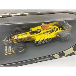 Three Minichamps 1:18 scale die-cast racing cars - Jordan Mugen Honda 198 D. Hill; Jordan Ford EJ13 G. Fisichella; and Stewart Ford SF 1 R. Barrichello; all boxed (3)