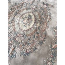 Chinese washed woollen pale ground carpet with overall floral design 