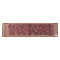 Afghan hand-knotted wool runner, dark red and indigo blue madder, with a repeating central...