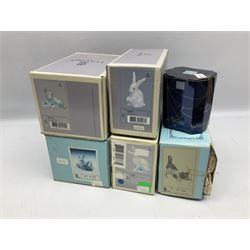 Six Lladro figures, comprising A Friend for Life no 7685, Rabbit Eating no 4773, Sitting Bunny no 5907, Washing up no 5887, Surprised cat no 5114 and Scar-dy Cat no 5092, all with original boxes, largest example H15cm 