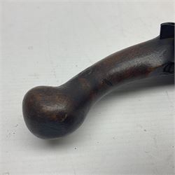 Late 18th/early 19th century flintlock tinder lighter, the steel box lock with hinged door to the left side, fruitwood butt with plain bar trigger, the left side set with a taper sconce and bipod front support, L21cm.