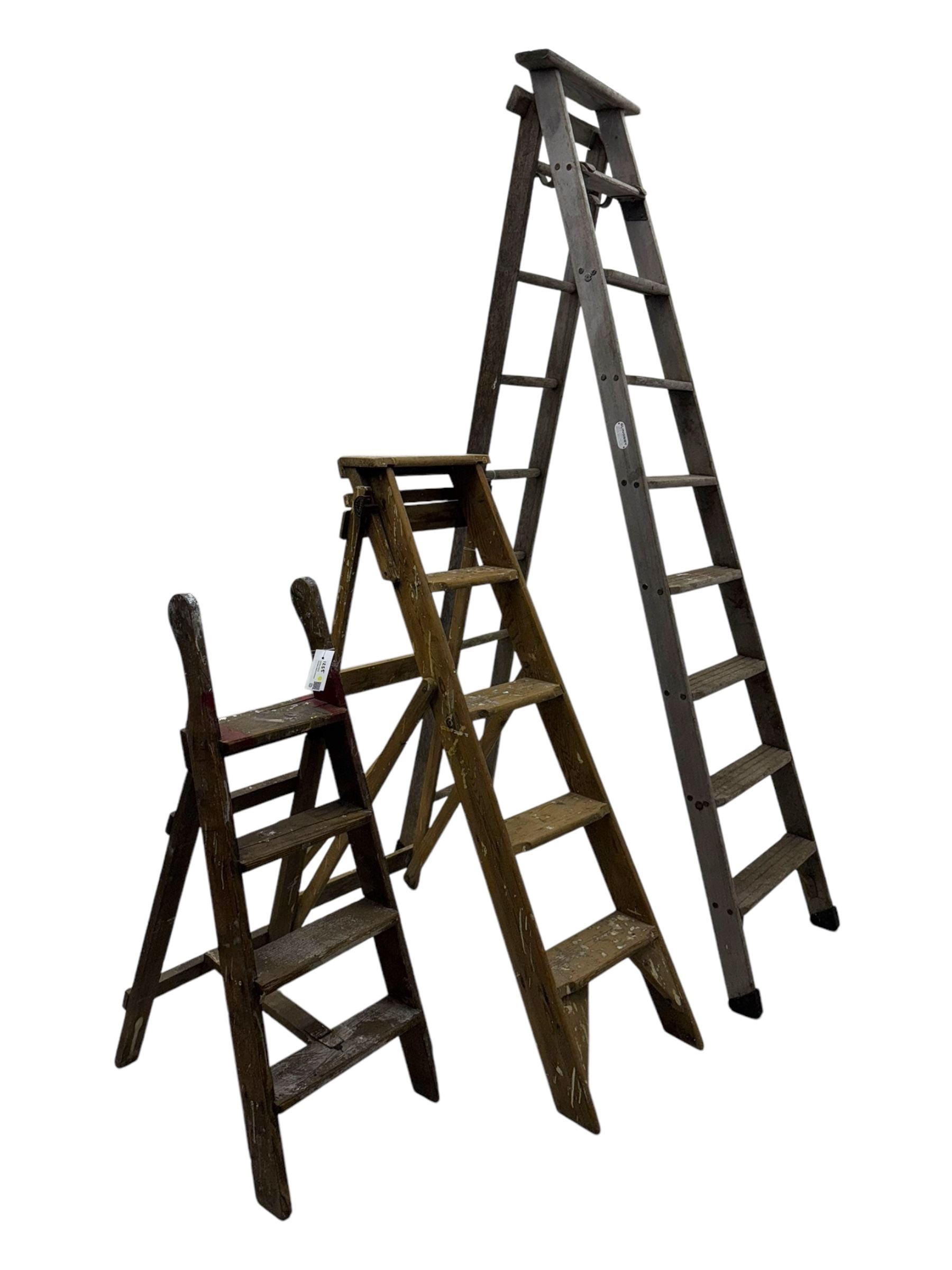 Slingsby - large pair of wooden ladders; G A Jones's - wooden steps; and a small wooden step ladder (3)