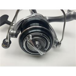 Four fixed spool reels, all in original boxes, comprising Shimano Ultegra 5500 XSD, with spare spool, Mitchell Autosurf 700, with spare spool, Shimano Sedona 600 FB with spare spool and D.A.M Quick 5001