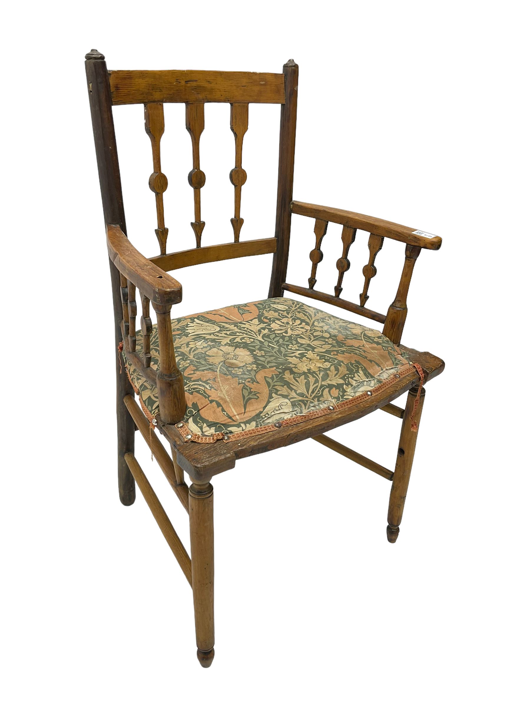 19th century ash and beech Sussex type elbow chair, the back and arms with arrow shaped vertical rails, upholstered seat, on turned supports