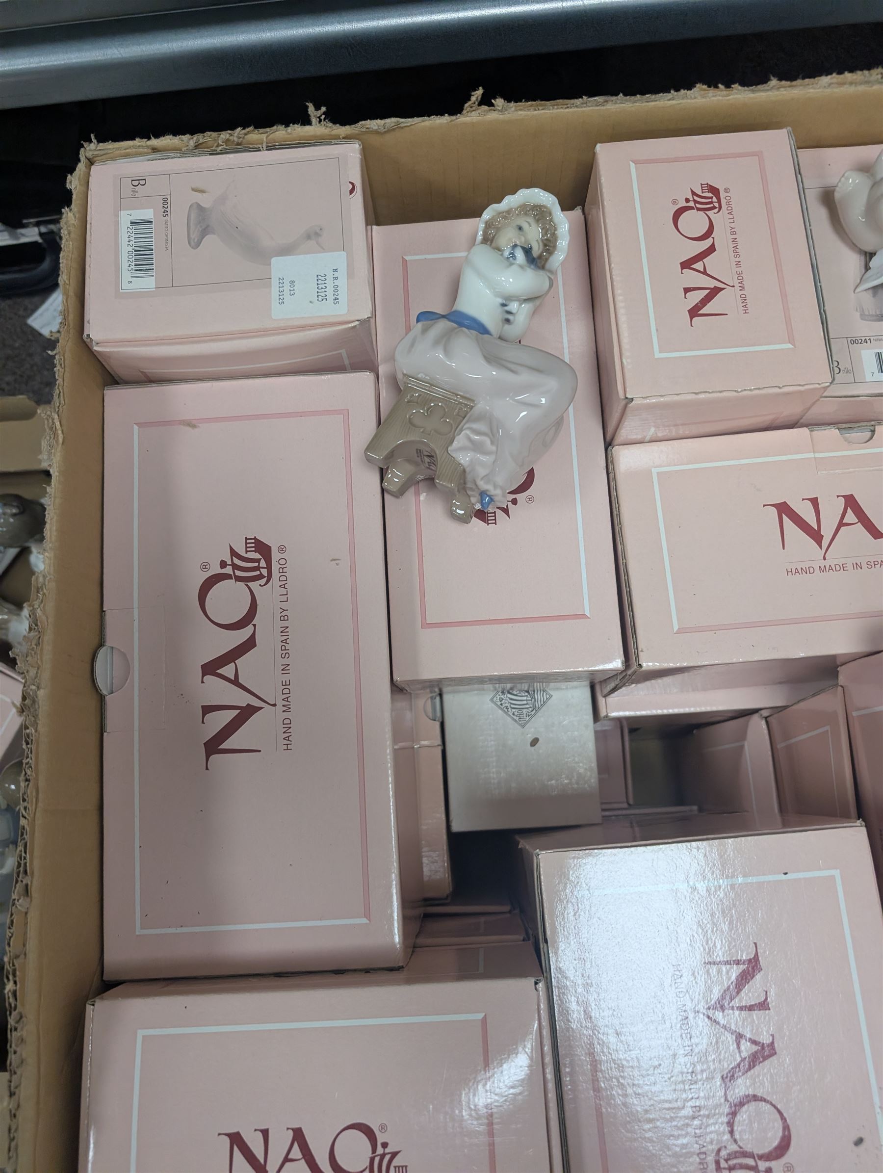 Collection of Nao figures, including boxed examples, in two boxes