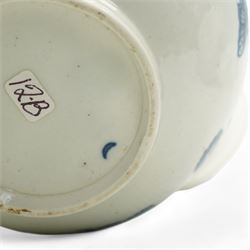 First Period Worcester porcelain teapot decorated in the Three Flowers pattern, with flower knop handle, H15cm and Worcester fluted dish decorated in the same pattern, both with cresent marks beneath (2)