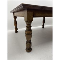 Large early 20th century oak boardroom table, rectangular moulded top on six turned and faceted supports 