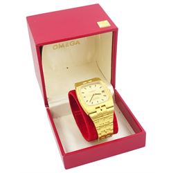 Omega Constellation gentleman's 18ct gold automatic wristwatch, champagne dial, with baton hour markers and date aperture, on Omega 18ct gold bracelet, No. 368.847, with fold-over clasp, stamped 750, boxed