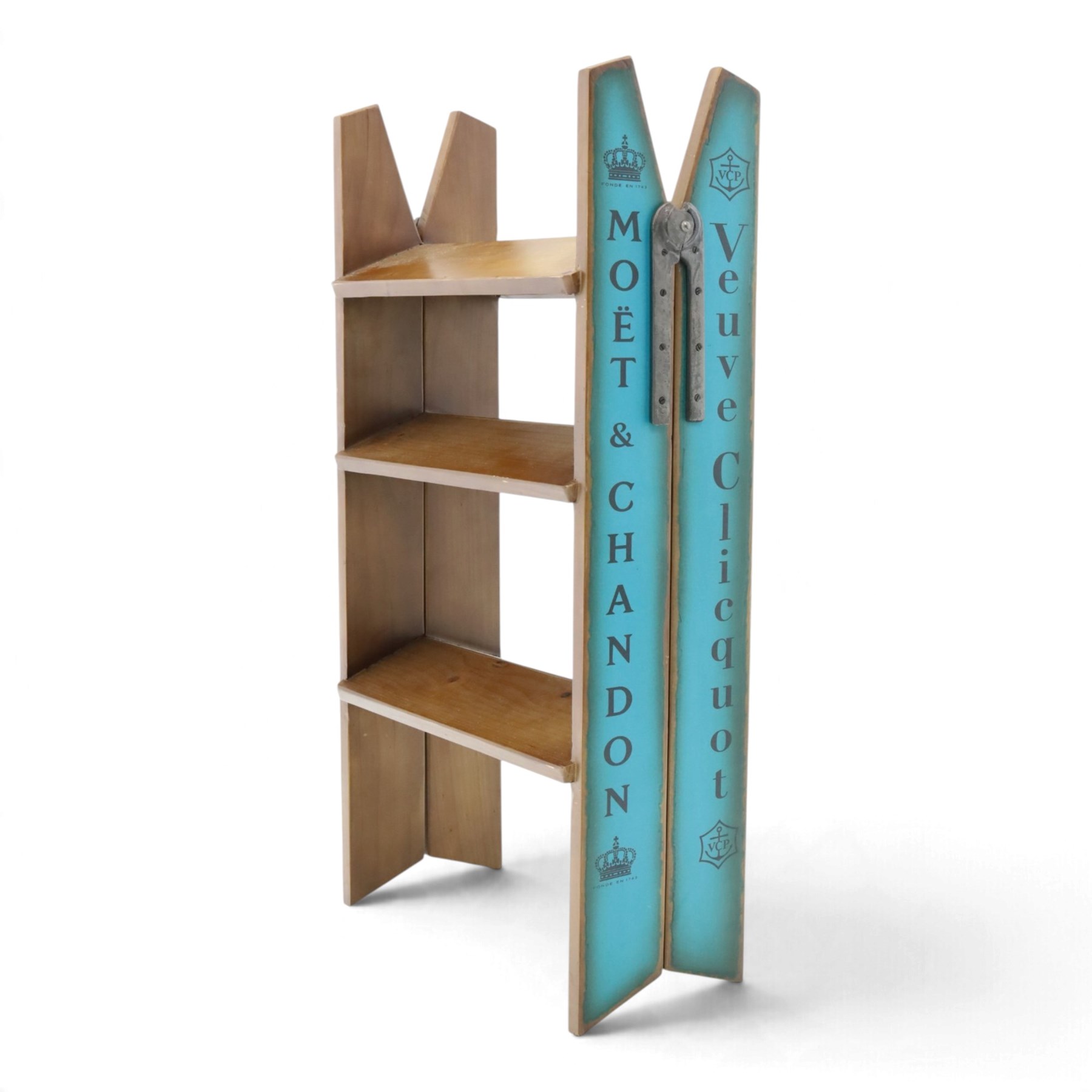Contemporary wooden folding stepladder, three treads to each side, turquoise painted panels bearing champagne logos, with metal hinges and folding stays
