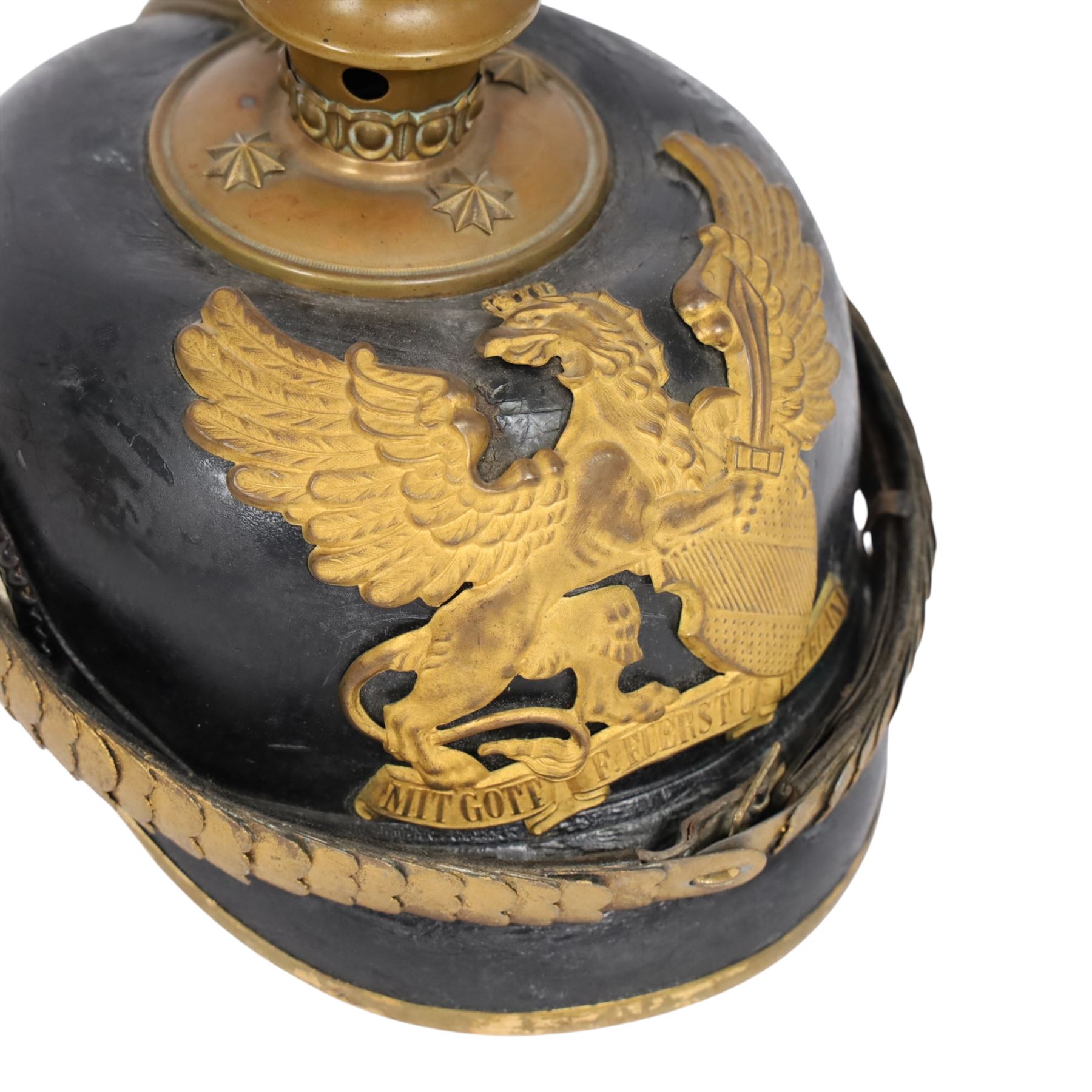 WWI Prussian Pickelhaube, Baden Infantry Regiment, the black leather skull with detachable brass spike, the circular base plate set with four star retaining studs, brass eagle helmet plate, both sides with red and black cockades