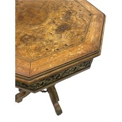 Mid-20th century figured walnut Italian design centre table, octagonal quarter veneered top with cross banding and moulded edge, the skirt decorated with scrolling foliage gilt metal mounts, on turned pedestal mounted with gilt acanthus leaves, quadruple splayed supports with further acanthus leaf decoration
