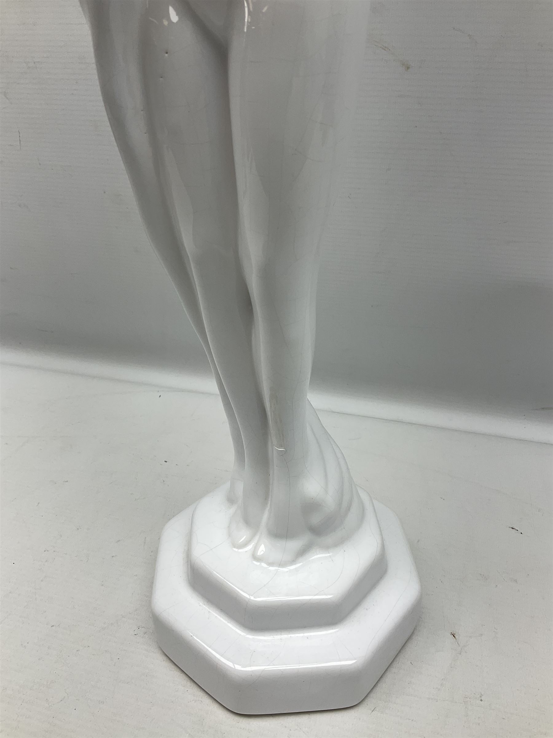 Art Deco style lamp modelled as a nude female dancer, with draped folds of linen, H46cm