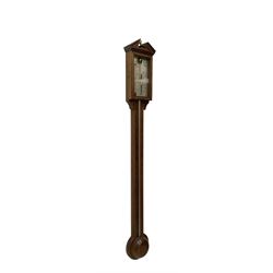 Comitti-20th century mercury stick barometer in an 18th century style mahogany case with satinwood stringing, with a broken pediment, brass finial and round base, silvered register with recording vernier, weather predictions and a centigrade/Fahrenheit spirit thermometer enclosed within a glazed door, visible tube with a bulb cistern and turned mahogany cover.
Mercury clean and present with no air locks.