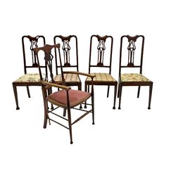 Set four early 20th century beech dining chairs and an early 20th century beech elbow chair, all with shaped and pierced splats