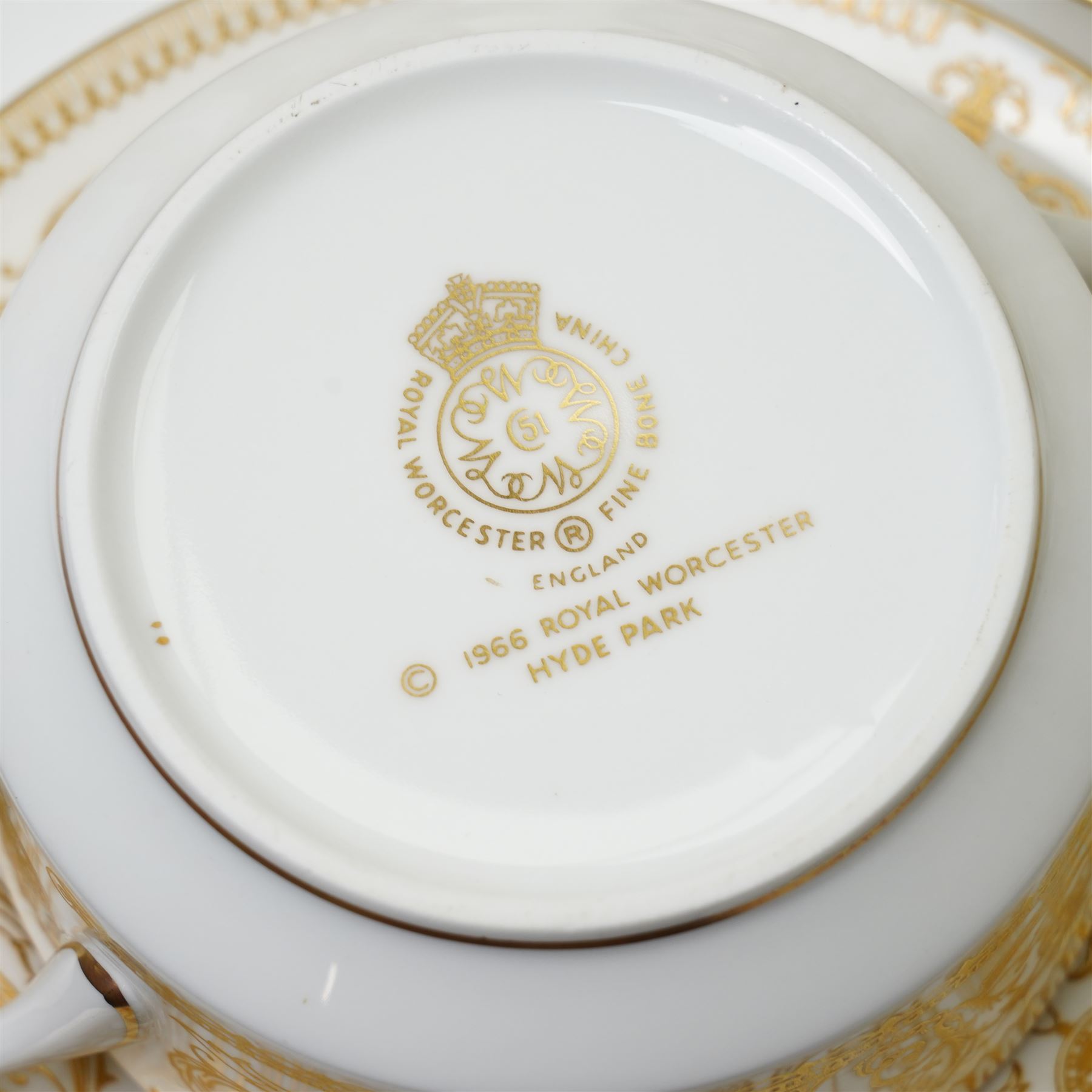 Royal Worcester Hyde Park tea and dinner wares, comprising nine dinner plates, nine smaller dinner plates, thirteen side plates, nine soup bowls and saucers, eleven teacups, eleven saucers, sauceboat and saucer, four covered tureens and one platter