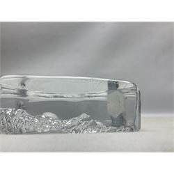 Two Mats Jonasson, Sweden paperweights, comprising polar bear in ice cave no 3152 and lion cubs, both with etched marks beneath, tallest H11.5cm