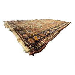 Belgian Sultan woollen ground rug, central navy field densely decorated with floral sprays and geometric patterns (192cm x 135cm); handwoven tribal terracotta ground rug (121cm x 71cm); Persian crimson ground runner, all over stylised floral and foliate motifs (266cm x 94cm)