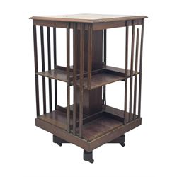19th century oak chest of drawers, rectangular moulded top over two short and two long drawers, on plinth base (W99cm, D53cm, H81cm); early 20th century glazed mahogany display cabinet; Edwardian mahogany revolving bookcase (3)