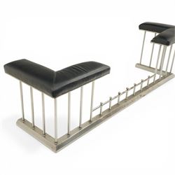 20th century steel club fender, with black leather seats above a steel frame