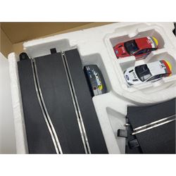 Scalextric - Formula One set with McLaren Mercedes and Williams BMW cars; and Speed Extreme set with Ford Focus cars; both boxed with accessories and paperwork; and Parker Pro-Action football game; boxed (3)