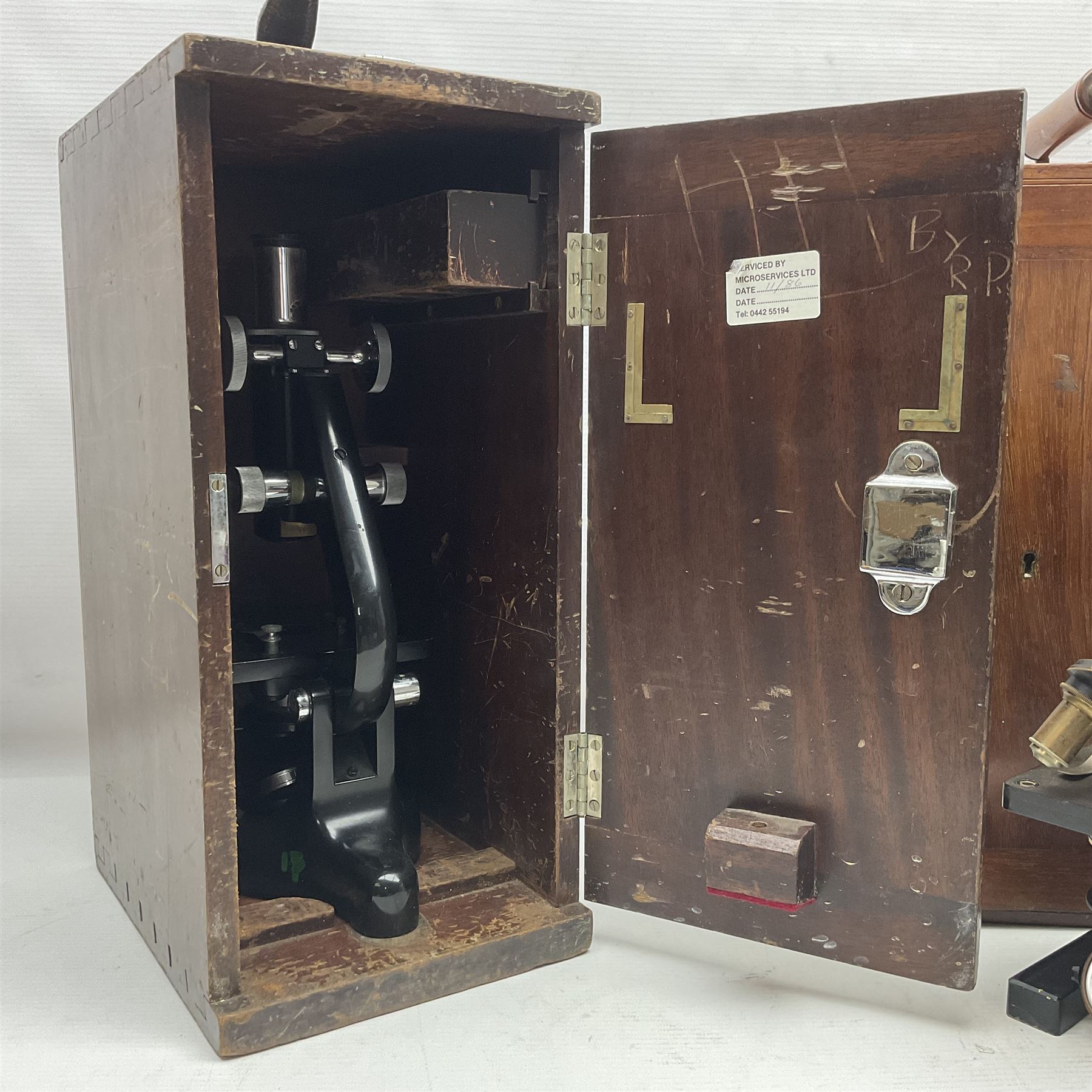 20th century W. Watson & Sons Kima microscope no. 118396 in original oak box, together with W. Watson & Sons Praxis microscope no. 18360, in original box  