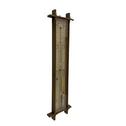 Admiral Fitzroy - Early 20th century Fitzroy barometer in a glazed gothic influenced oak case with chamfered uprights and top and base panels, full length paper scales with Fitzroy's observations and predictions, mercury bulb cistern, storm glass, spirit thermometer and brass sliding vernier pointers. Retailed by Inglis & Son, Coney Street, York.