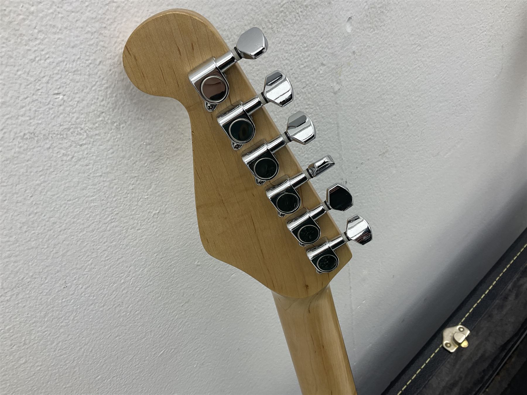 Fender style sunburst electric guitar with manuscript mark 'Zenta Stratocaster 1963' L97cm; in hard carrying case; another similar unmarked sunburst electric guitar; in gig bag; and Fender Frontman Amplifier, serial no.M473406 (3)