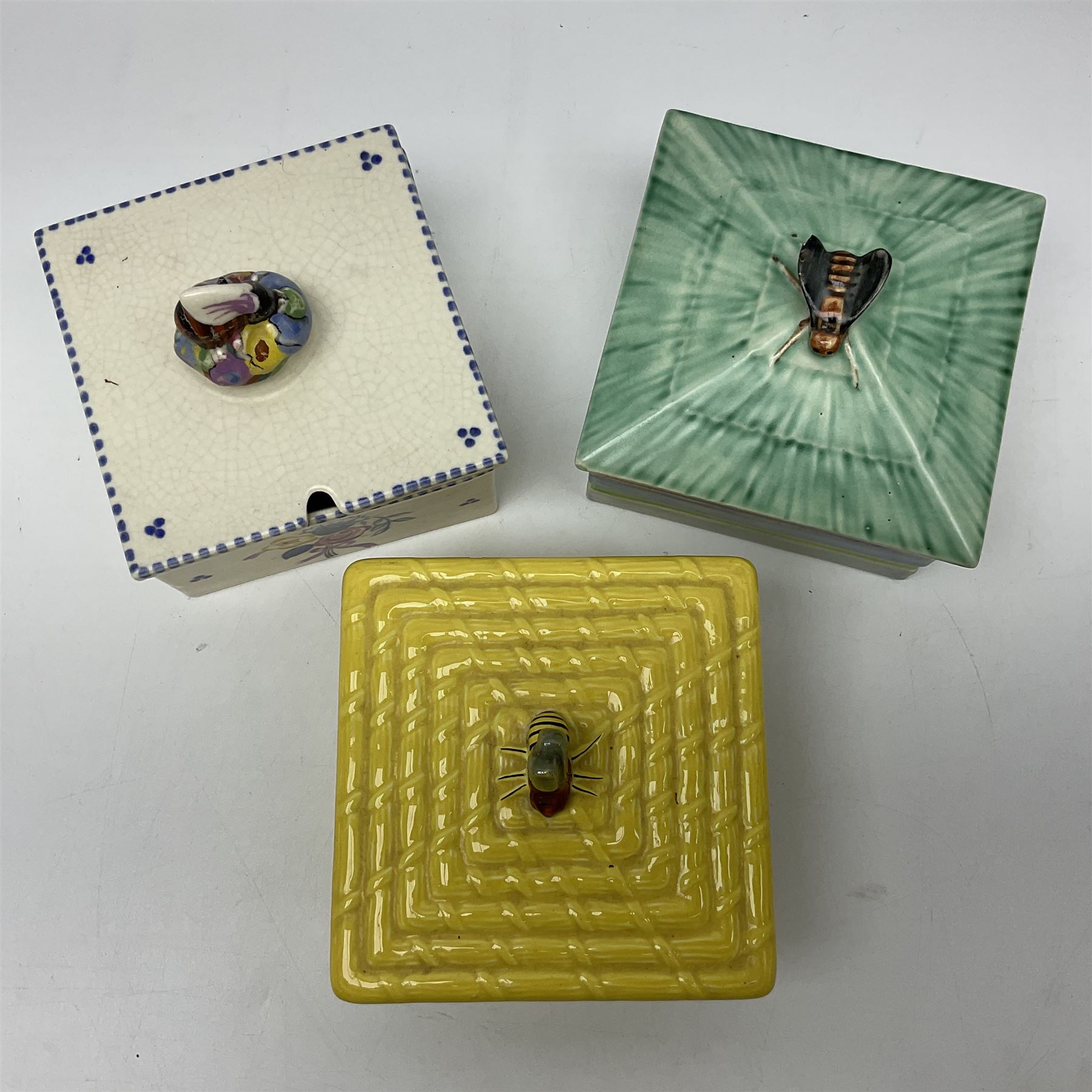 Clarice Cliff for Wilkinson Ltd Crocus Bizarre beehive honeypot painted in the Crocus pattern, together with two beehive Beswick honey pots, Poole square honey pot etc (14)