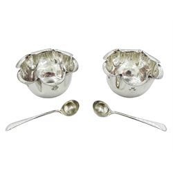 Pair late Victorian silver open salts, each of circular form with crimped rim, hallmarked Horace Woodward & Co Ltd, London 1897, and a pair of salt spoons, hallmarked John Grinsell & Sons, London 1898, contained within a fitted case, approximate total silver weight 1.02 ozt (32 grams)
