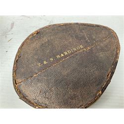 19th century Watkins combined clinometer and compass, patent 217, by J. Hicks Maker 8 Hatton Garden London No.5829, of drum shaped form in lacquered brass case D7cm; both instrument and case bear the name of former owner Thomas S.N. Hardinge; with early 20th century postcard caricature of a serviceman (2)