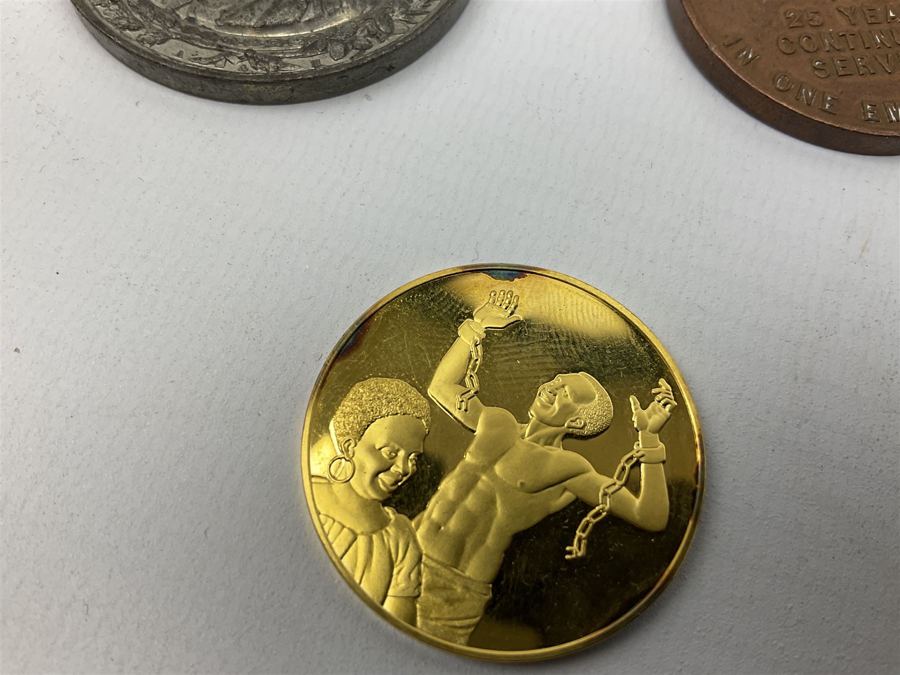 Wilberforce and the Slave Trade silver gilt medallion. First edition No.369; Hull Times bronze Long Service Medal; Hull Education Committee bronze school attendance medal; and a silvered medallion to Commemorate Queen Victoria's Visit to Hull Oct.14 1854; all uncased (4)
