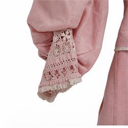 Edwardian ladies pink linen bodice and skirt, with eyelet closure and lace detailing to skirt cuffs and collar, with gathered and pleated detailing 