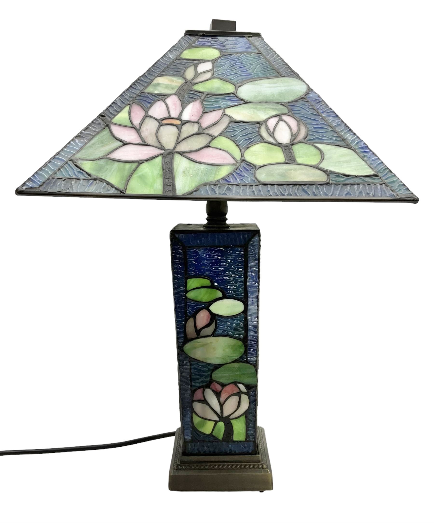 Tiffany Pond Lily style table lamp and shade with leaded panels of green, pink and rippled blue water effect ground, raised upon brushed metal base, H50cm
