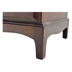Stag Minstrel - mid-20th century mahogany dressing chest, rectangular top surmounted by adjustable mirror, the upper section fitted with four small drawers over two full-width drawers, on bracket feet
