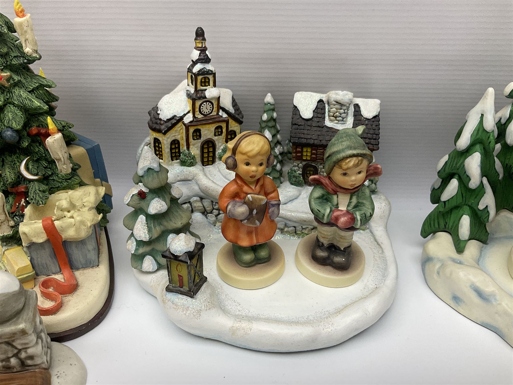 Large collection of Christmas themed Hummel figures and Hummel scapes by Goebel, to include Winter Friend, Making New Friends, Tree Trimming Time, Winter Adventure etc