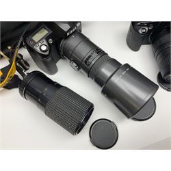 Four camera bodies, to include, Ricoh KR-10 serial no. 38826, Pentax MZ-M serial no. 4185969 with 'SMC Pentax- M 1:3.5 28mm' lens, Canon EOS500 serial no. 080927, with 'Sigma Zoom 100-300mm 1:4.5-6.7 DL'  lens etc, with other camera lenses and equipment 