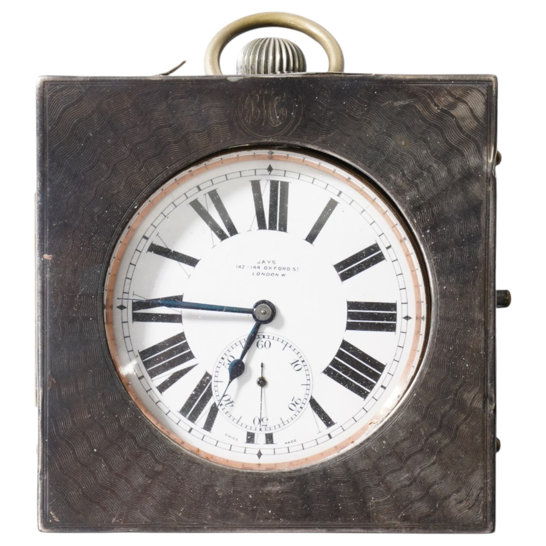 Early 20th century nickle cased goliath pocket watch by Jays, London, in silver engine turned travelling case London 1913 and one other nickle cased goliath pocket watch