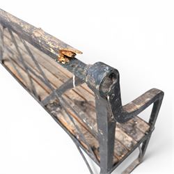 19th century and later Estate made wrought iron strapwork garden bench, the weathered wooden cresting rail over X-form strapwork back and slatted wooden seat