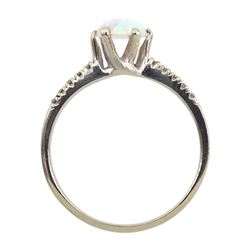 9ct white gold opal ring, with cubic zirconia shoulders, hallmarked