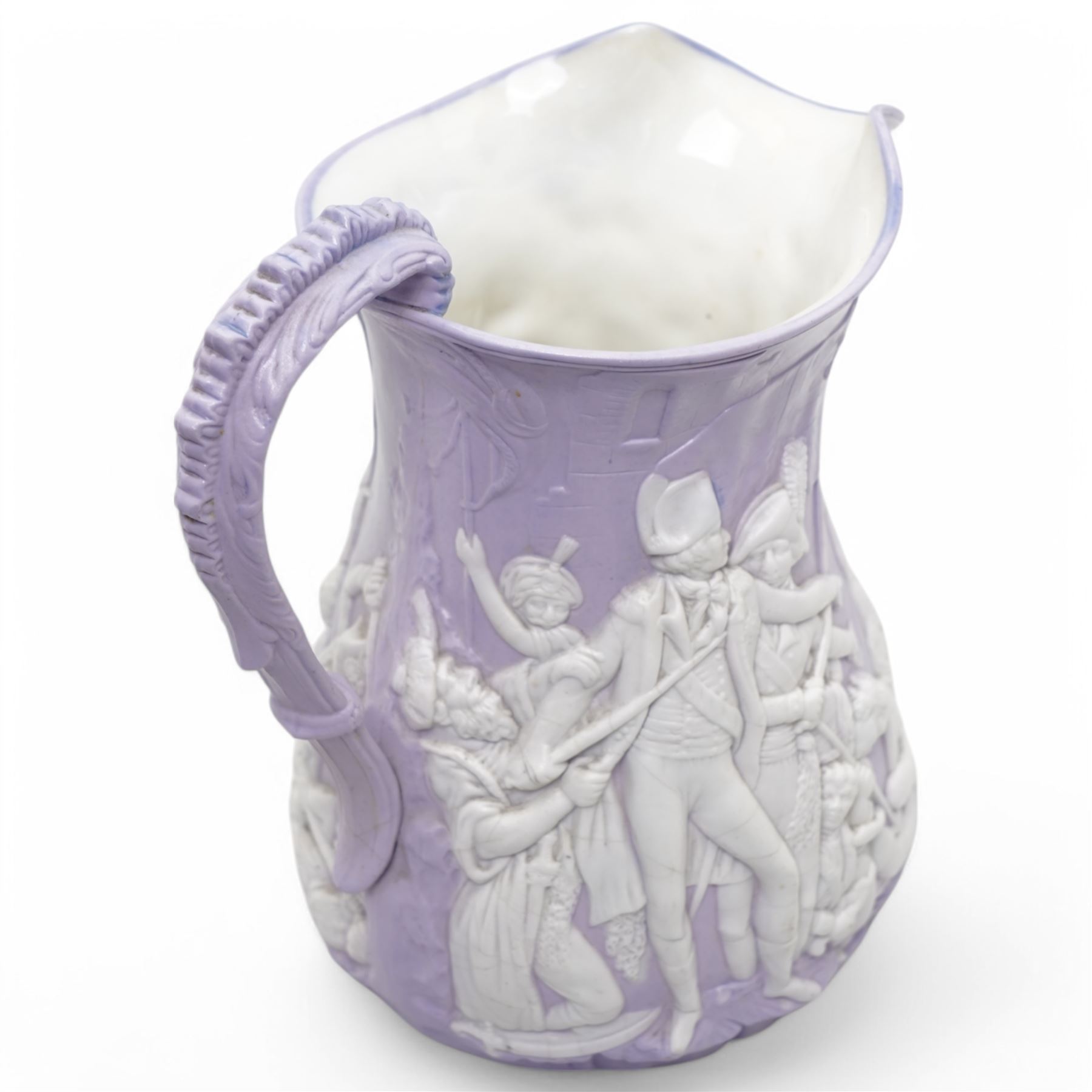 Samuel Alcock & Co lavender jug, decorated in relief with a Napoleonic scene from the Siege of Acre 1799, black printed mark to base, H22.5cm 