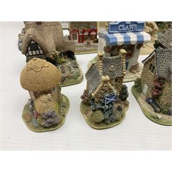 Twenty three Lilliput Lanes, including Village School, Lace's Shoe Shop, Cockles & Muscles, Scotland the Brave etc, together with The Leonardo Collection Paint Box Poppets and Gullivers World magazines 