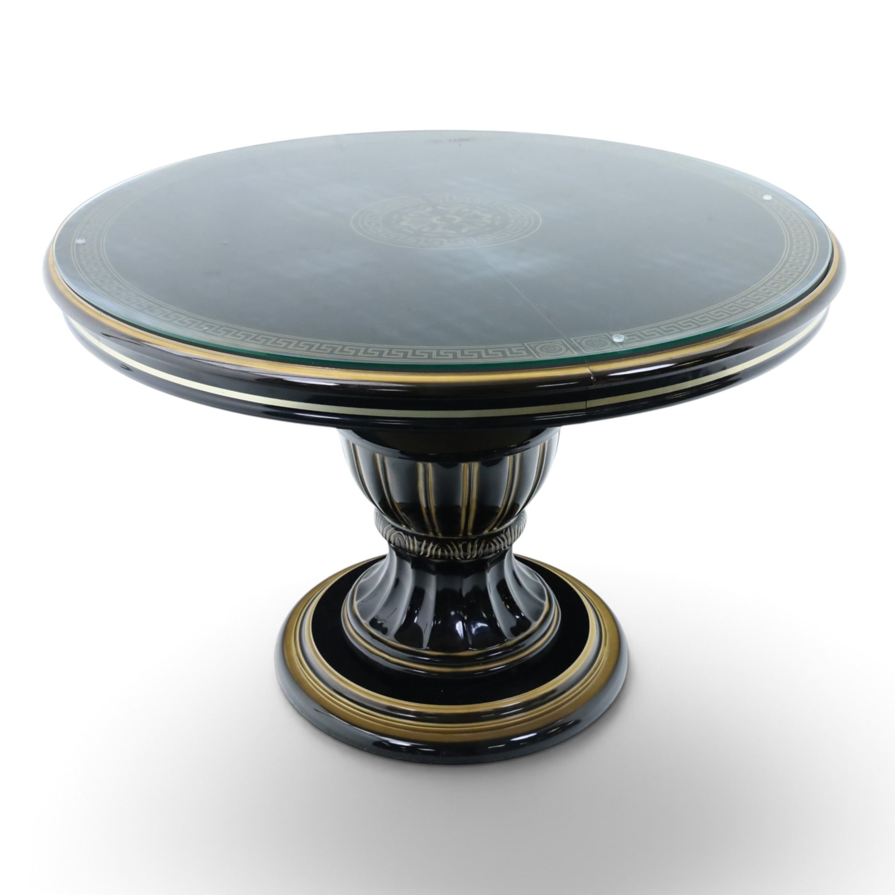 Italian Neoclassical inspired ebonised gloss dining table with four matching chairs,  circular top with additional leaf (Extends to  145cm) with Greek key banding, on a shaped pedestal base with gilt highlights and stepped plinth, the chairs en suite with padded back and seat with Greek key, reeded front supports