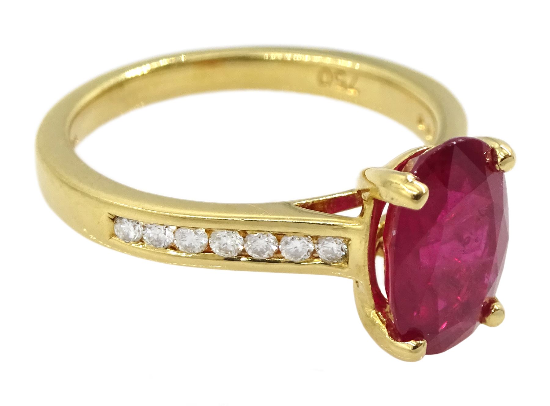 18ct gold oval ruby ring, with round brilliant cut diamond shoulders, hallmarked, ruby approx 2.35 carat