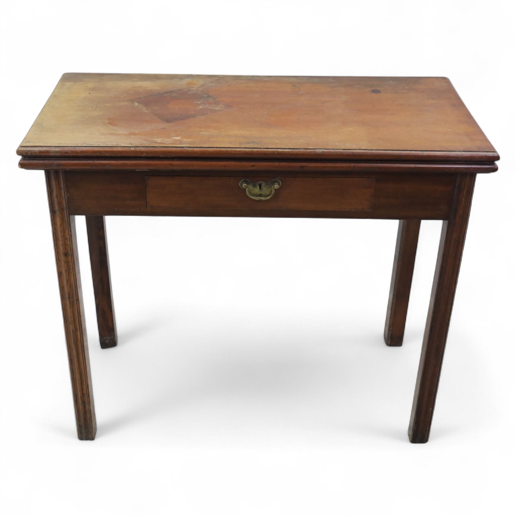 Georgian mahogany fold-over tea table, rectangular top with moulded edge over single frieze drawer with brass handle plate, on square tapering supports with gateleg