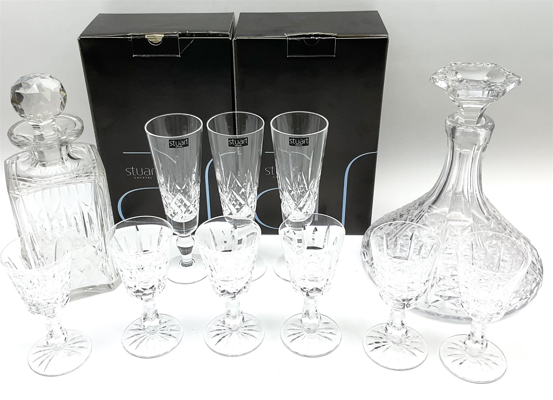Set of six Waterford Crystal sherry glasses, together with three Stuarts Crystal Glengarry pattern flutes, a Stuart Crystal ships decanter, and an Edinburgh Crystal square section decanter. 