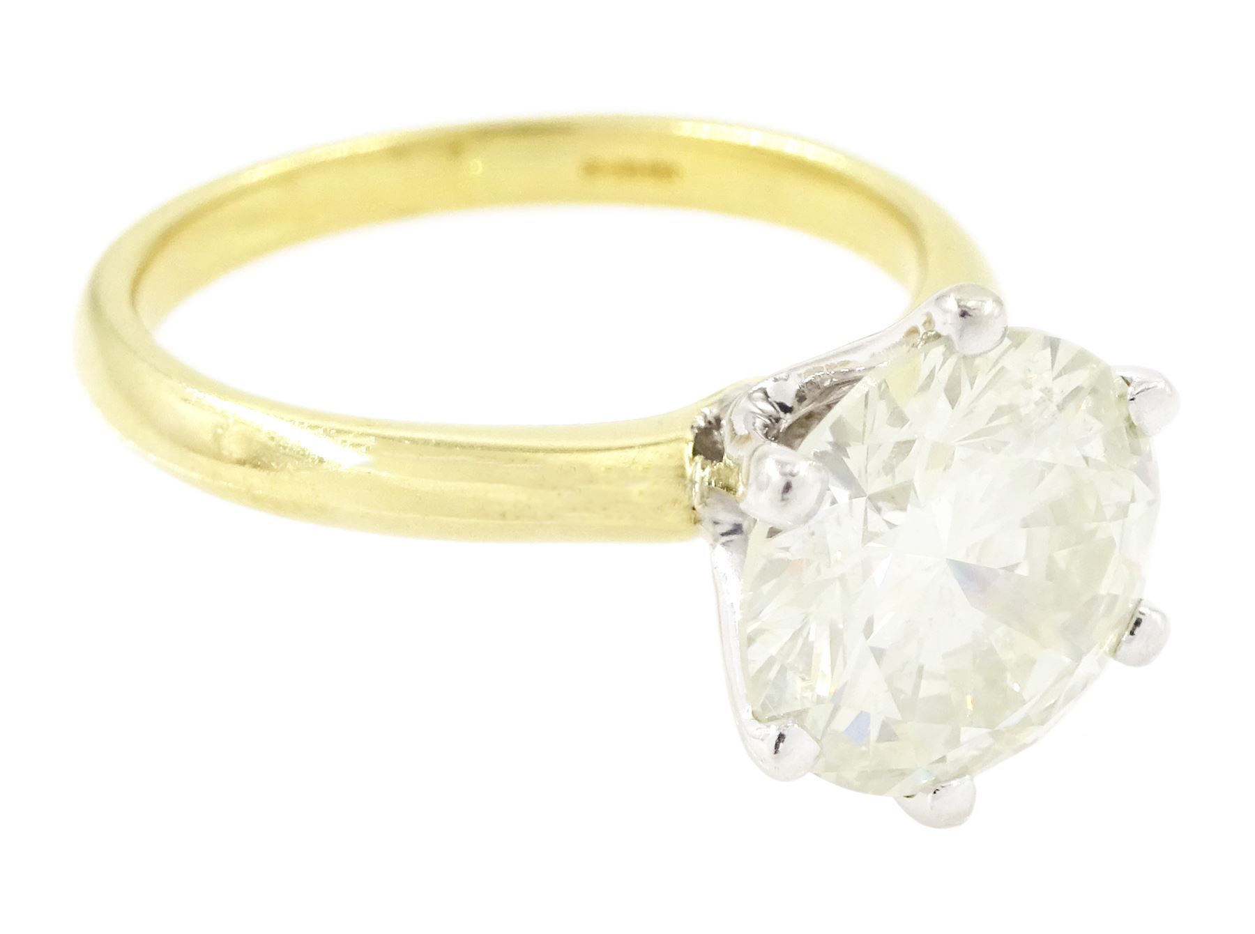 18ct gold diamond ring, six claw set with a single round brilliant cut diamond of 3.01 carat, with World Gemological Institute report